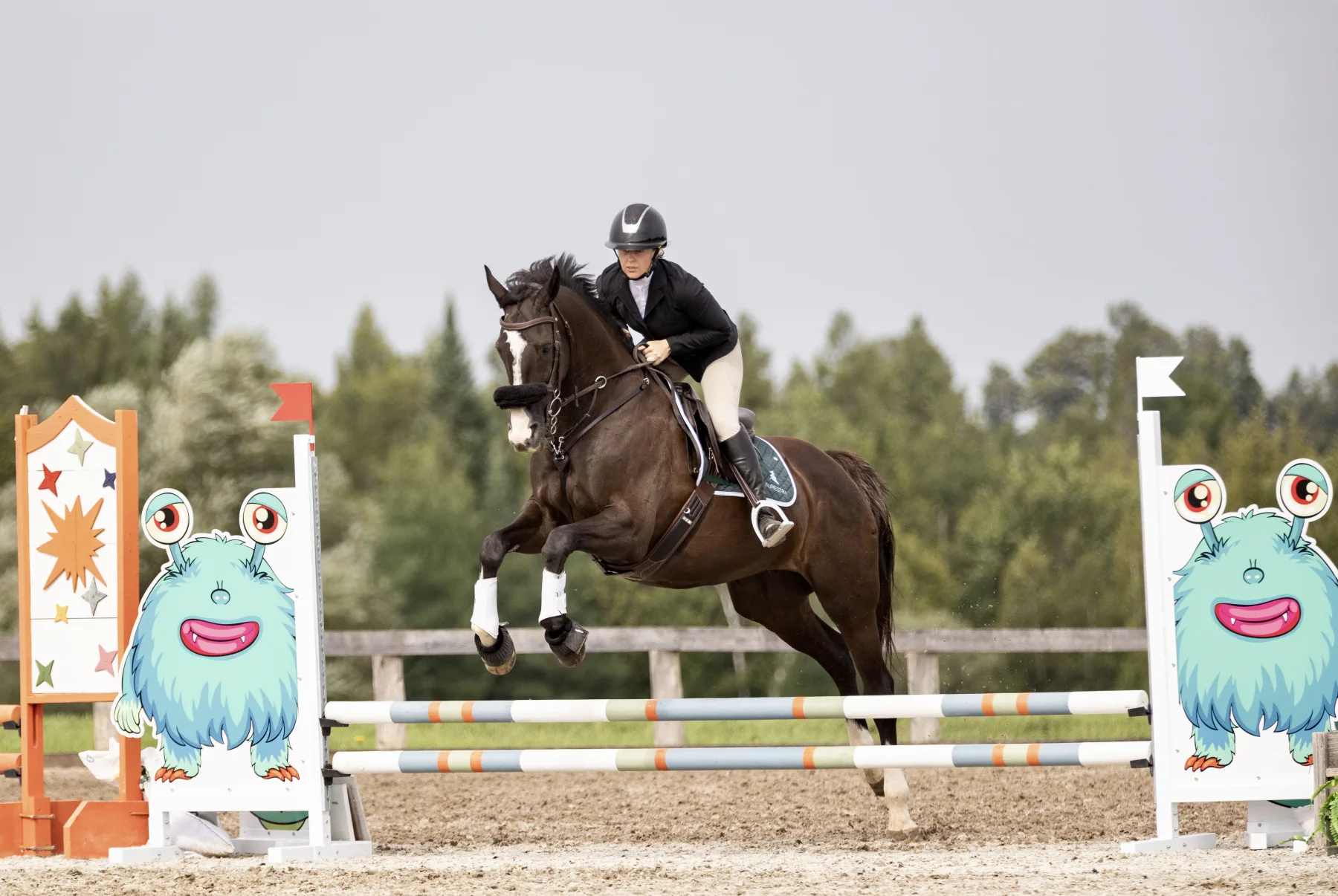 Jacklyn Wyatt jumping Bella, her Thoroughbred mare