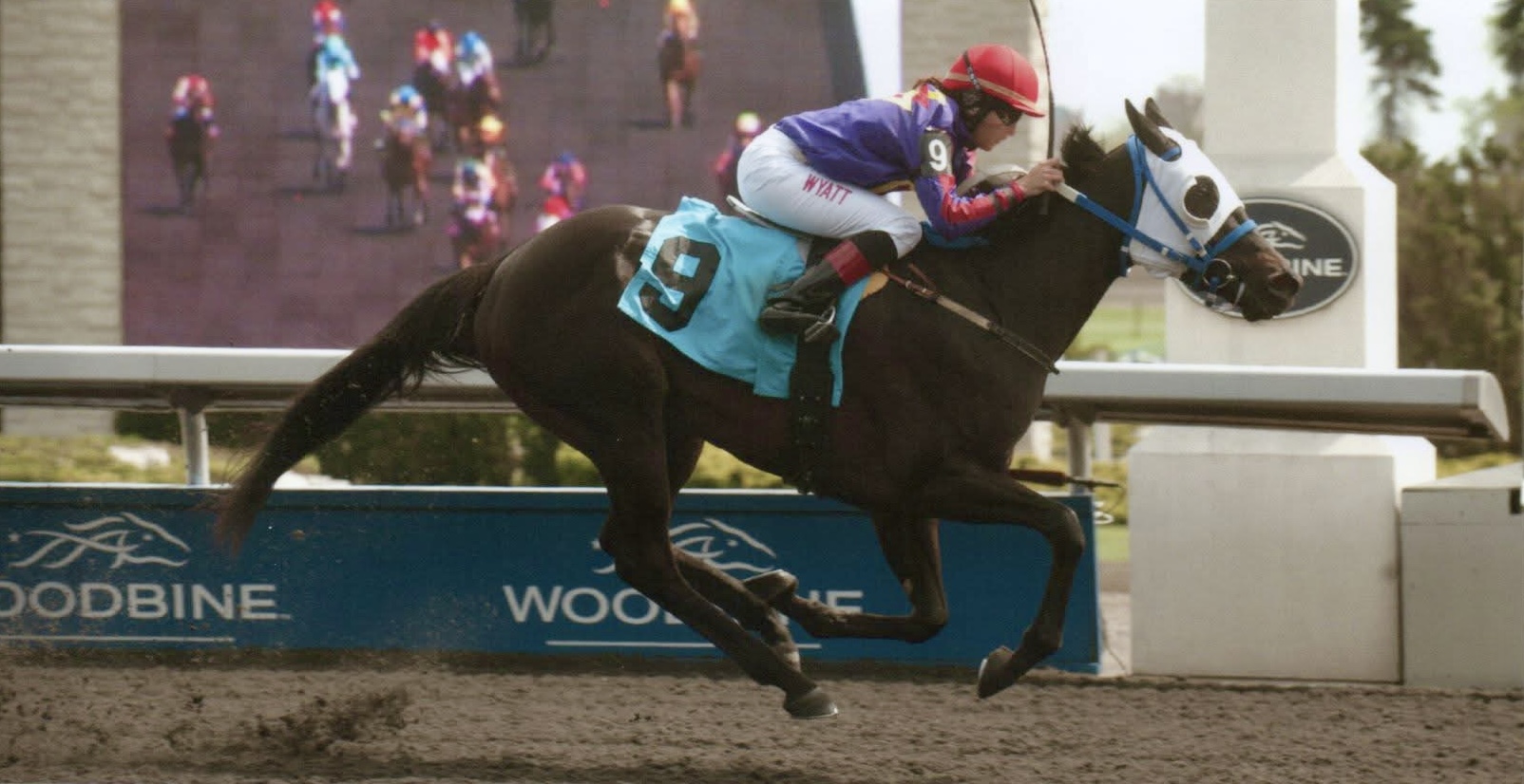 Jacklyn riding in a race